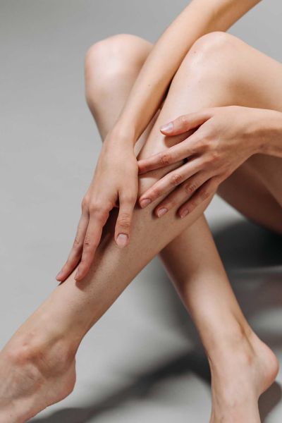 Legs and hands showing smooth skin